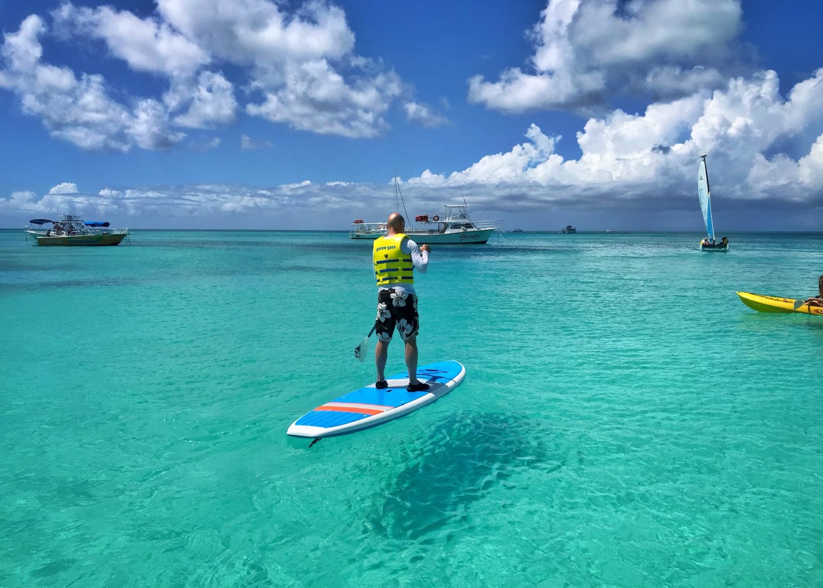 Paddleboarding in the turquoise water off Grace Bay, Turks and Caicos