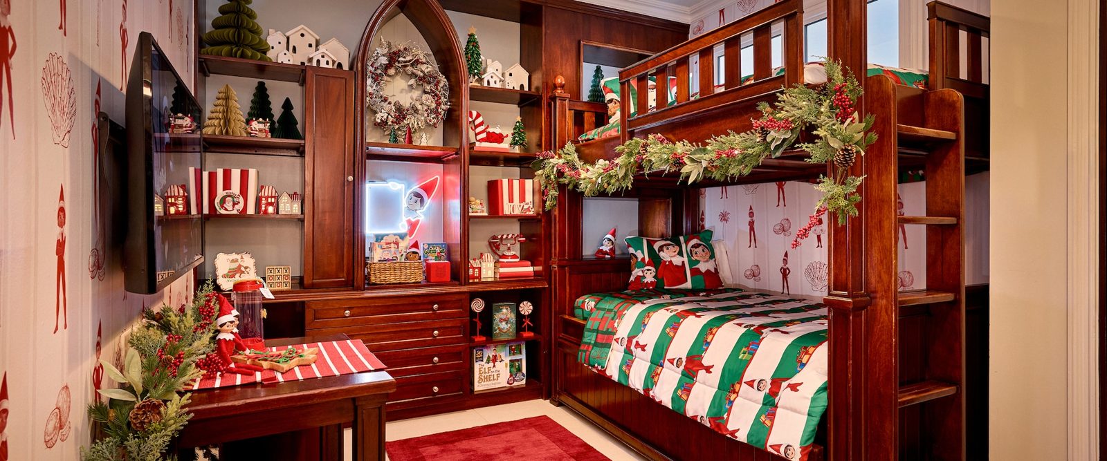 Kids' bunk room in The Elf on the Shelf Caribbean Vacation Suite at Beaches Turks and Caicos, with holiday bedding, Scout Elf plush toys and storybooks